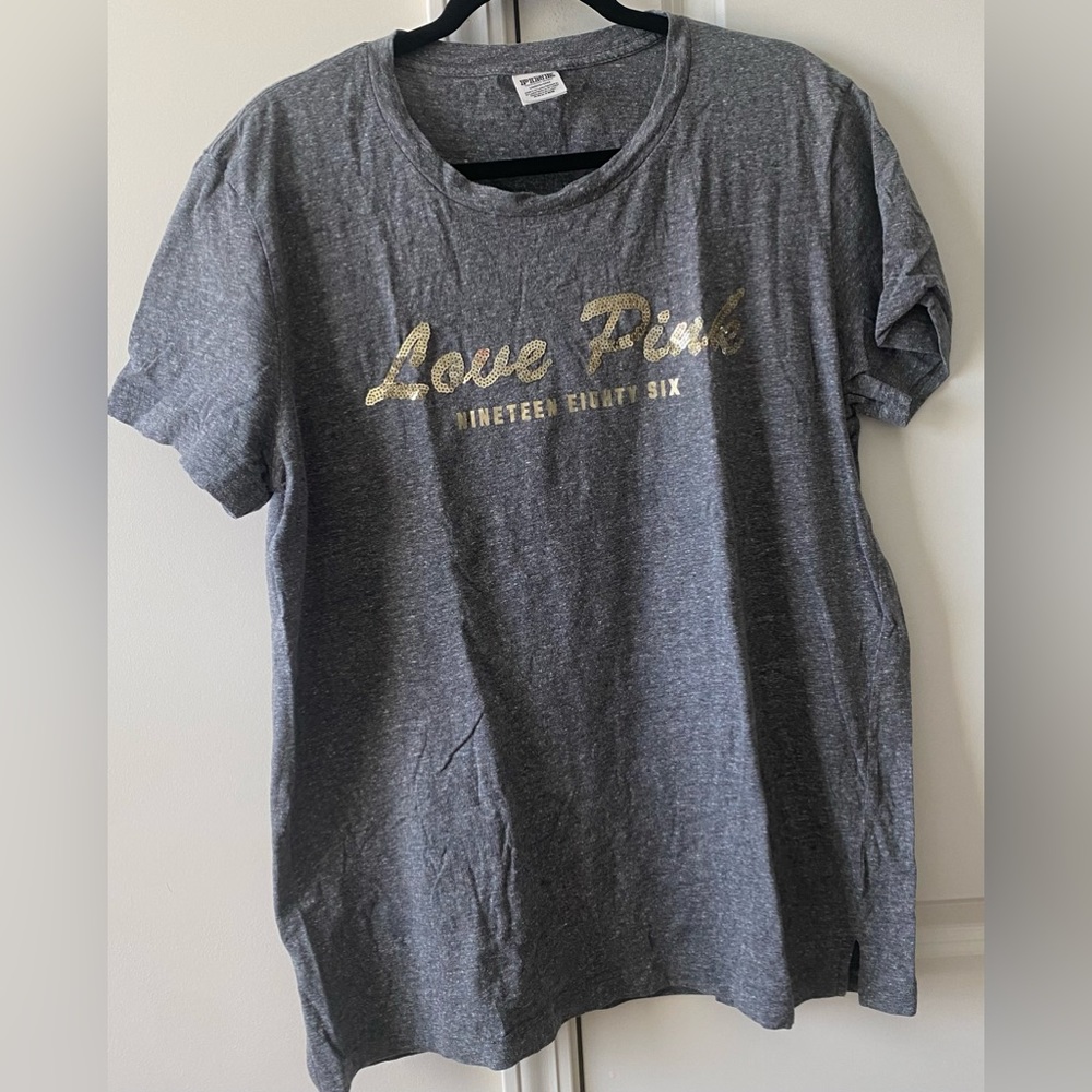 PINK  sequin tee shirt size large. No stains.